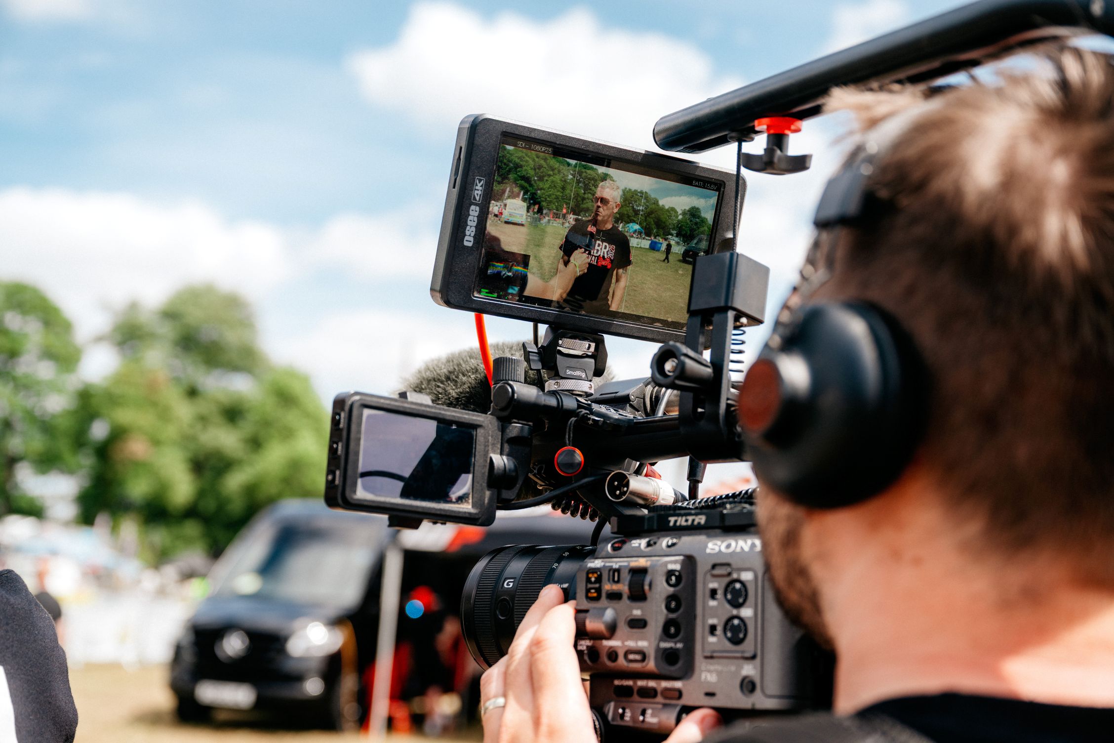 Man using camcorder.